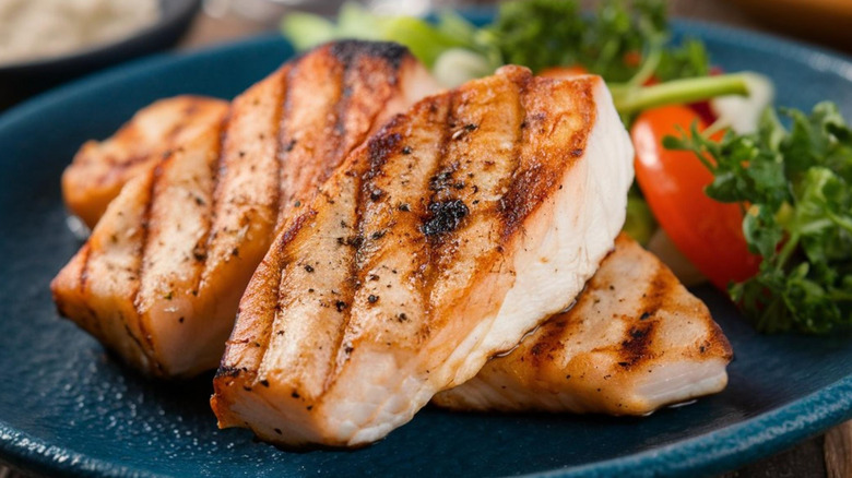 Grilled swordfish on plate