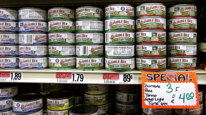 Cans of light tuna in grocery store