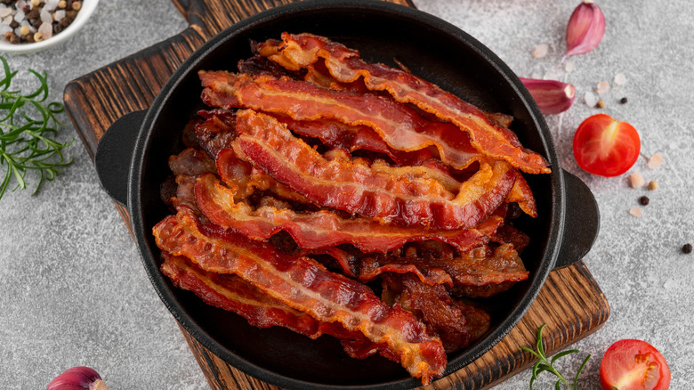 Crispy cooked bacon in a cast iron skillet