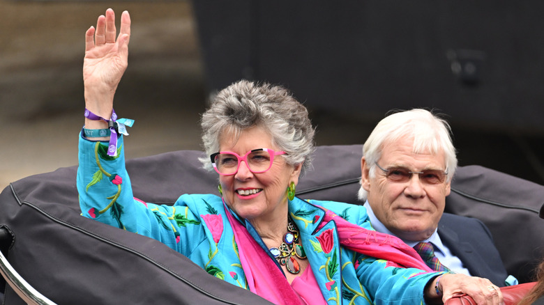 Prue Leith waving in car