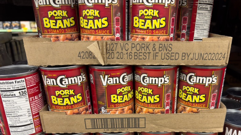 Cans of Van Camp's pork and beans on shelf