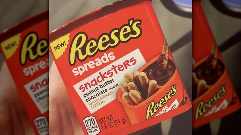 hand holding Reese's Spreads Snacksters