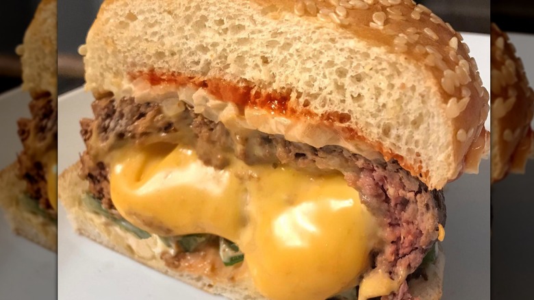 Cross-section of Jucy Lucy cheese-stuffed burger