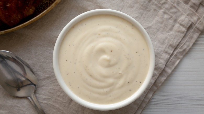 Small bowl of Alabama white bbq sauce