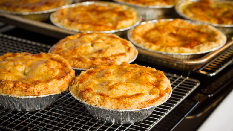 Chicken pot pies cooling on a rack