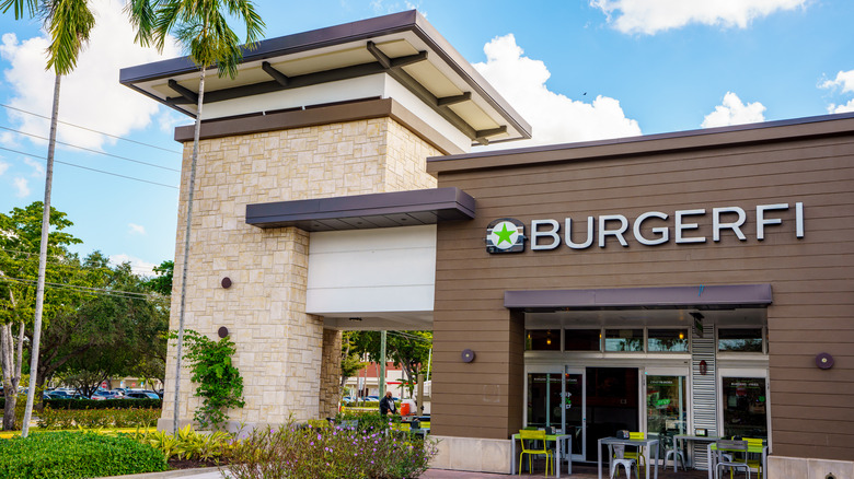 BurgerFi restaurant exterior against blue sky