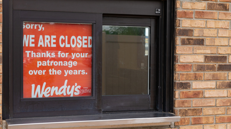 Closed sign in Wendy's drive-thru window