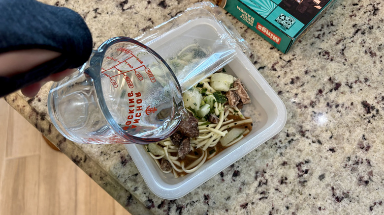 Mings Spicy Beef Ramen being prepared