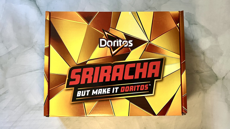 a box of Doritos Golden Sriracha