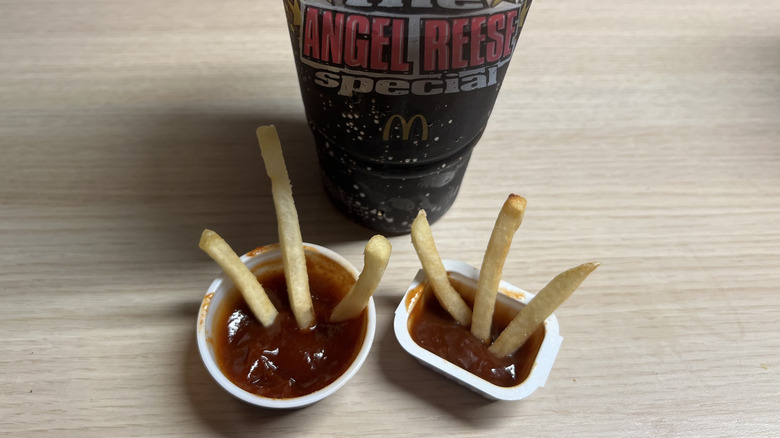 fries sticking in two BBQ sauces