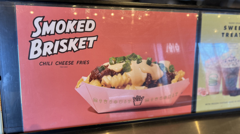 Shake Shack sign promoting chili cheese fries