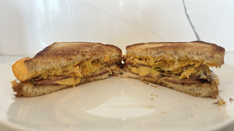 Fried bologna and cheese sandwich on a plate