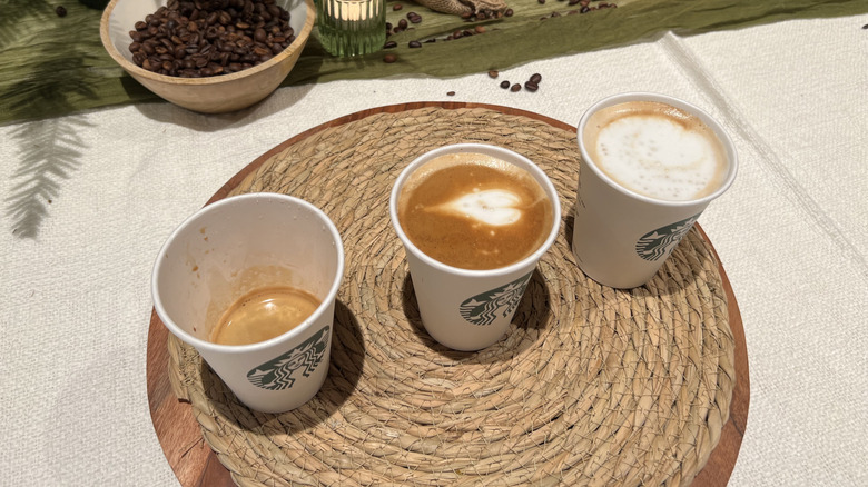 Starbucks' Doppio, Cortado, and Cafe Latte on a table