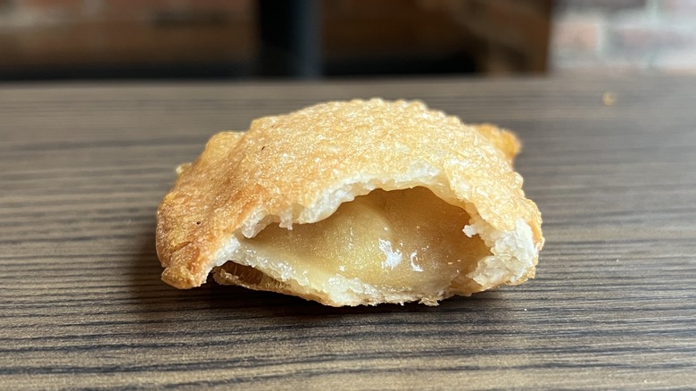 a partially eaten Caramel Apple Empanada