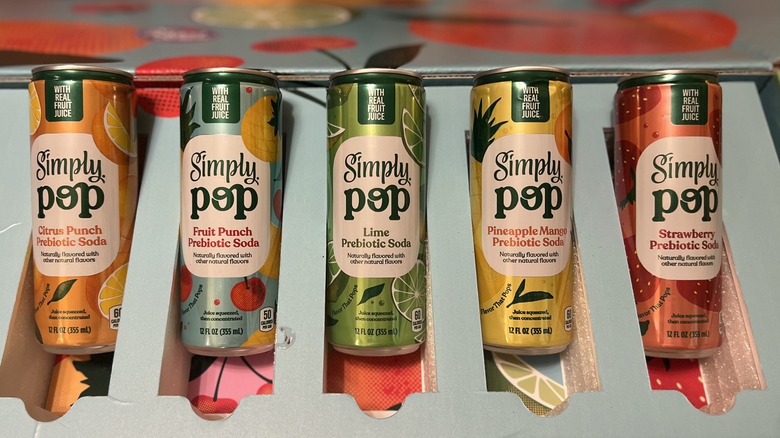 five Simple Pop cans on an angle