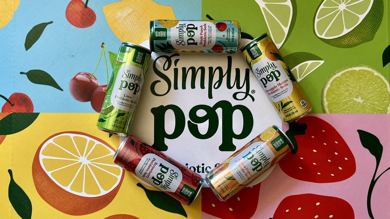 five cans surround the Simply Pop logo