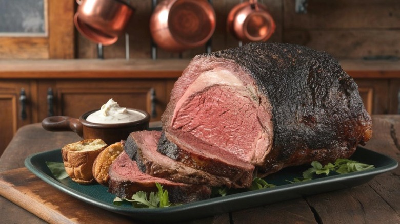 A prime rib roast with Yorkshire puddings.