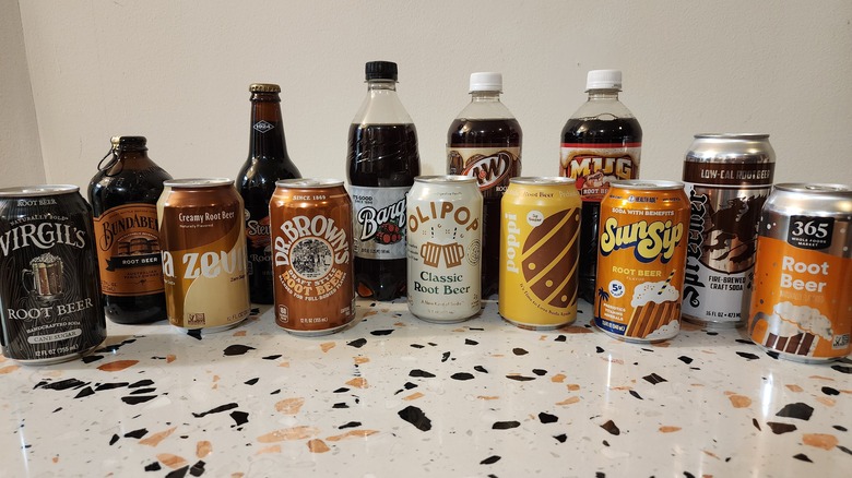 Bottles and cans of root beer