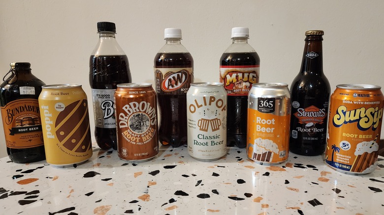 Bottles and cans of root beer