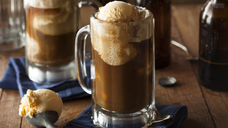 Root beer float with a scoop of vanilla ice cream on the side