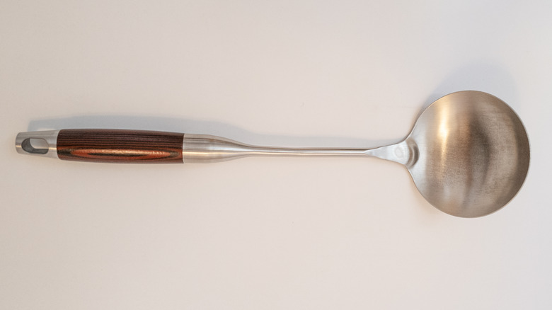 metal ladle on table