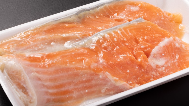 marinated salmon on styrofoam