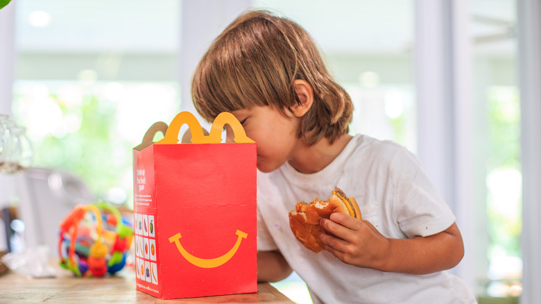 kid eating burger