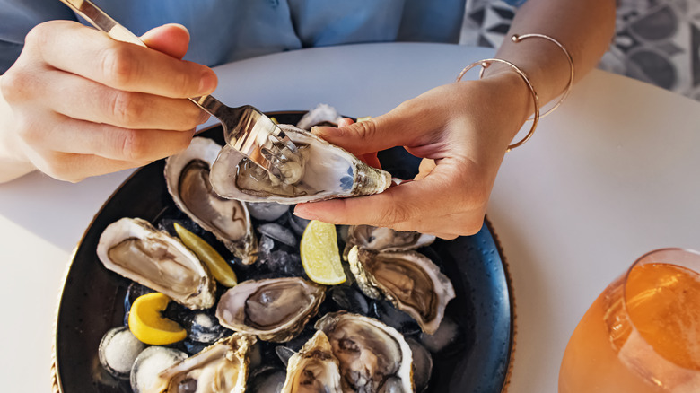 using fork on raw oyster