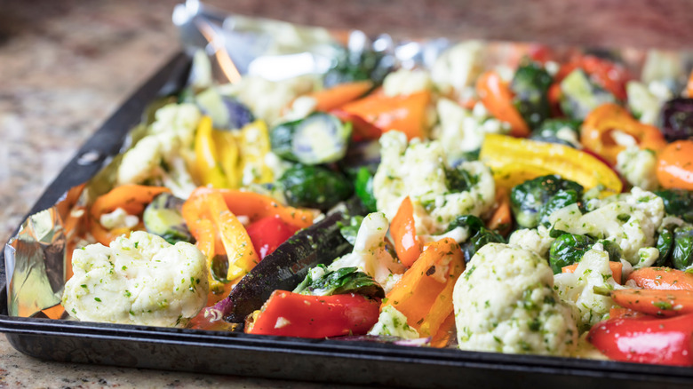 Food on a foil lined sheet pan.