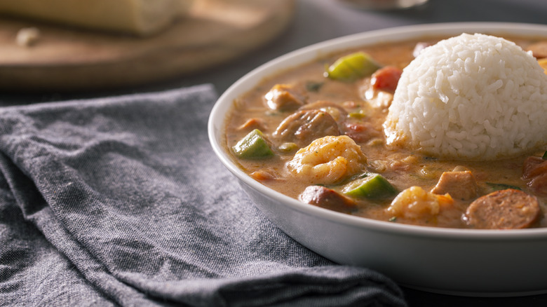 shrimp gumbo with rice scoop in middle