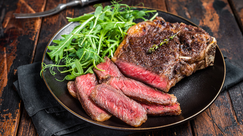 wagyu beef on black plate