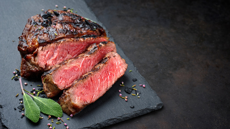 sliced Wagyu beef on slate