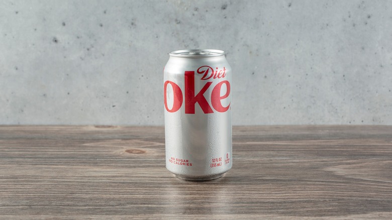 A Diet Coke can standing on a table