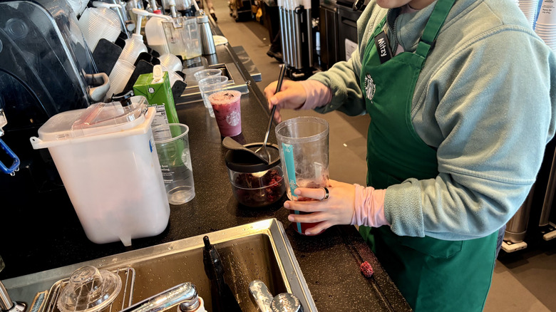 Scooping inclusions into Blackberry Sage Refreshers