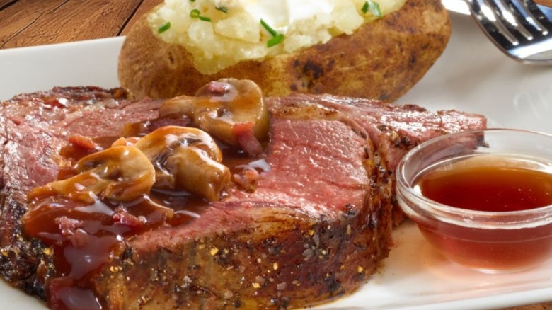 Steak with mashed potatoes on plate