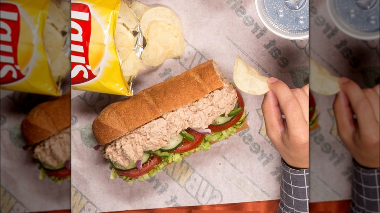 Subway tuna sub with chips and drink