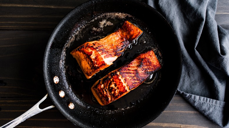 Salmon filets in a cast iron skillet