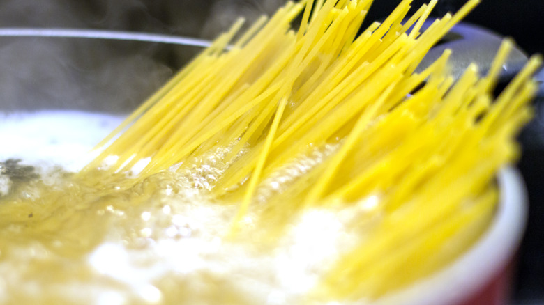 angel hair pasta in boiling water