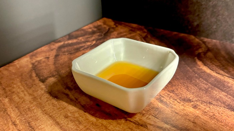 White ramekin with maple syrup