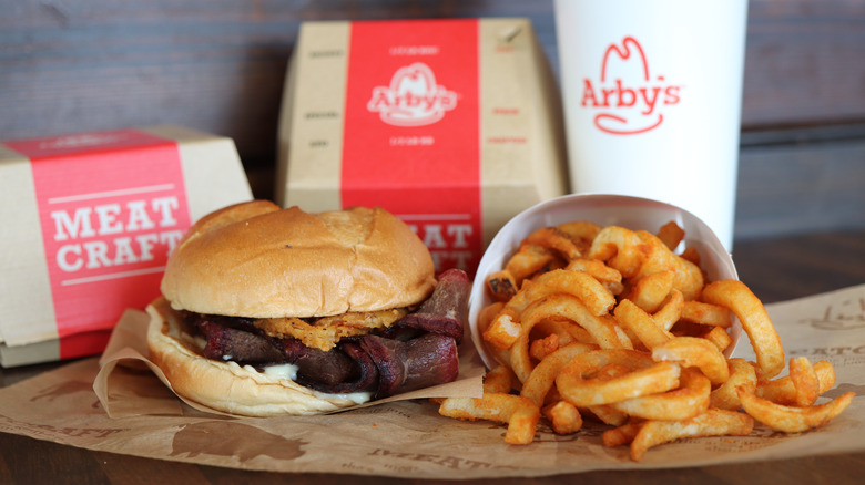 An Arby's brisket sandwich and curly fries