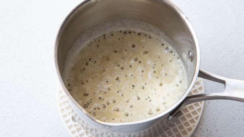 flour and butter bubbling in saucepan