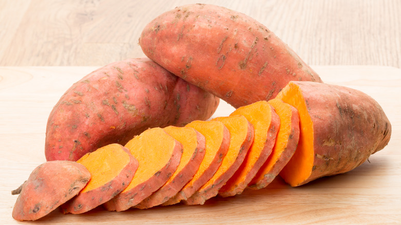 A sweet potato cut up into slices