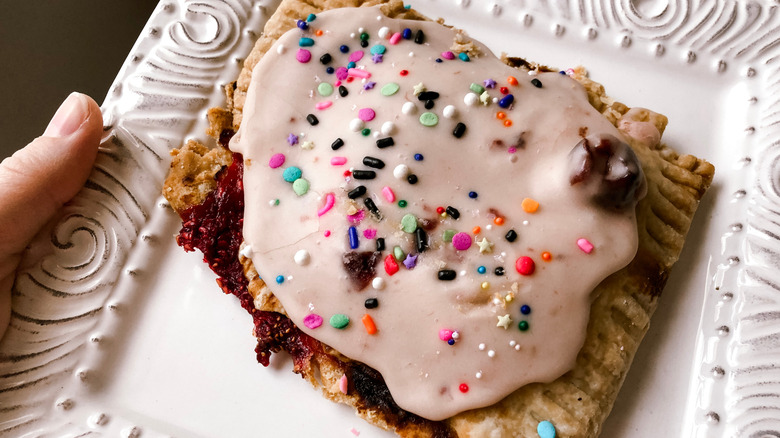 A homemade Pop-Tart with sprinkles on a plate