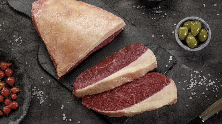 Raw picanha on a cutting board