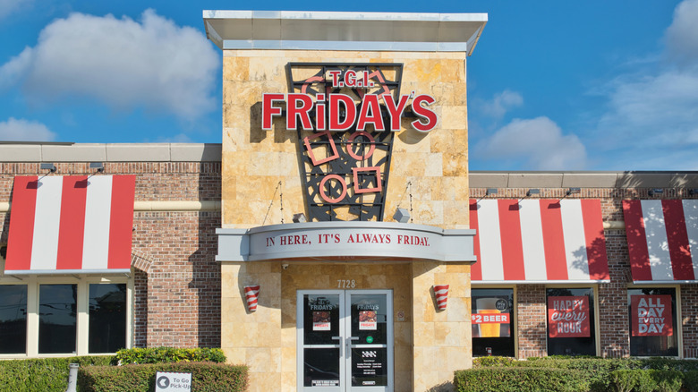 The exterior front entrance of a TGI Fridays restaurant.