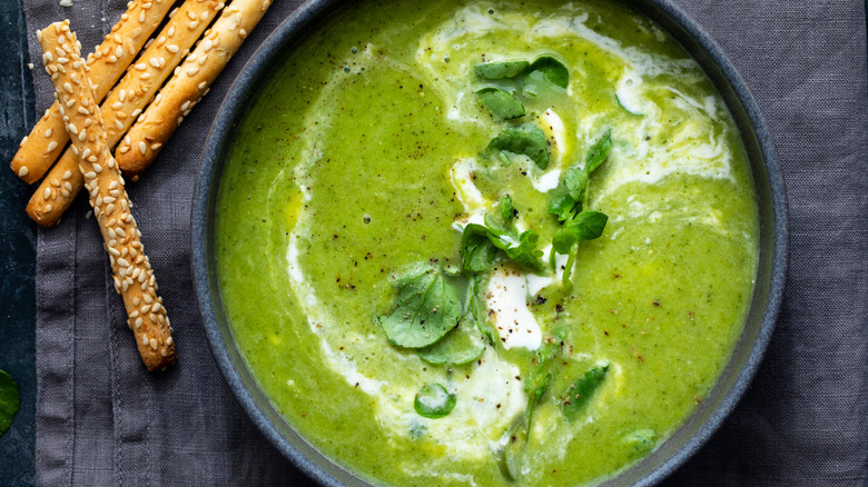 A bowl of watercress and leek soup.