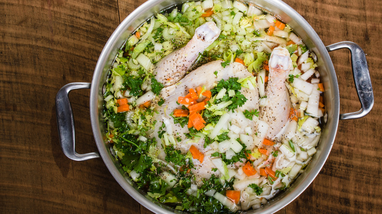 soup pot with chicken and vegetables