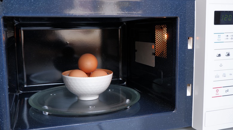 Bowl of eggs in microwave