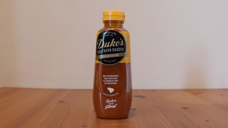 Duke's Carolina Gold BBQ Sauce on a wooden table