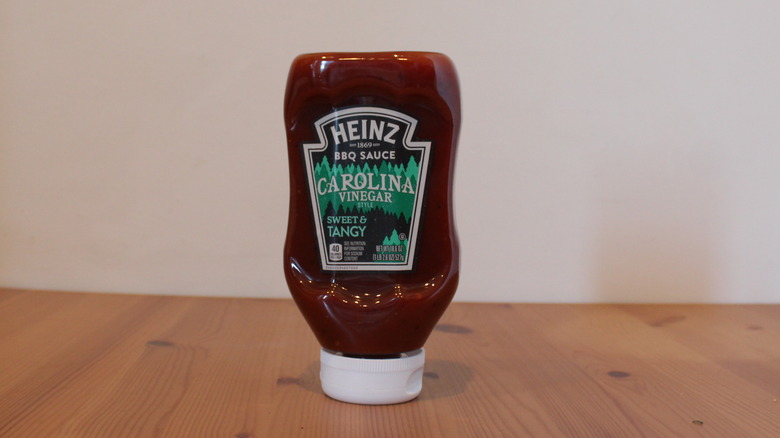 Heinz Carolina Vinegar Style BBQ Sauce on a wooden table